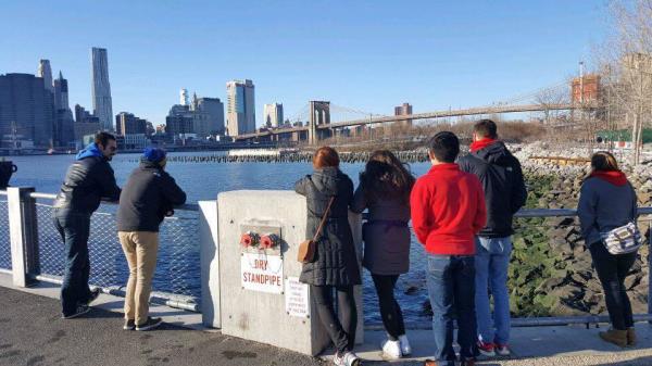 Group of Alt Break participants in front of Brooklyn Bridge