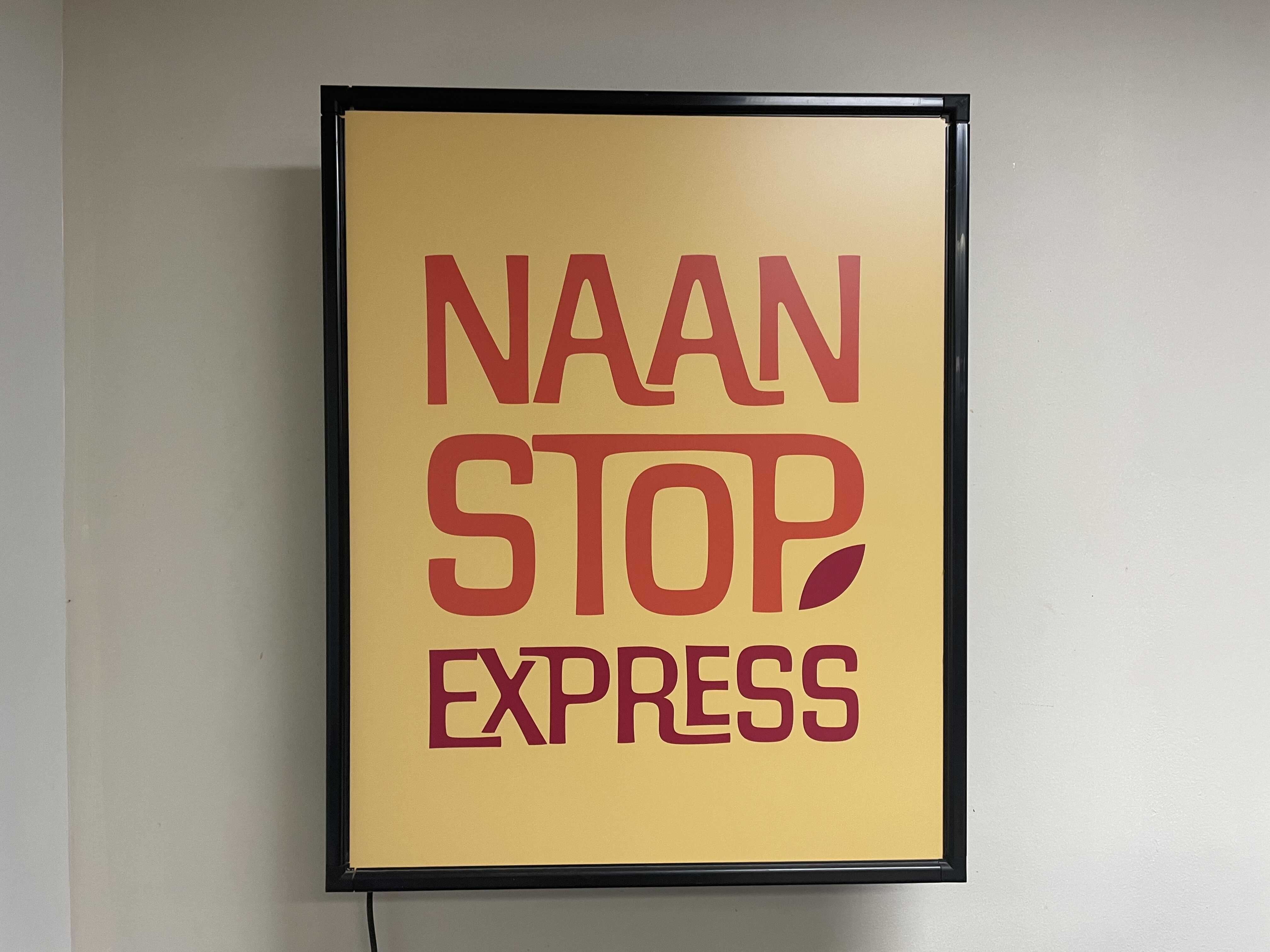 Naan Stop Express logo on sign