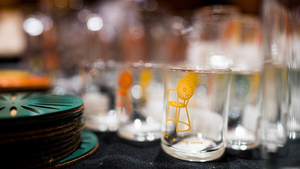 Glasses and coasters for sale at the Badger Market