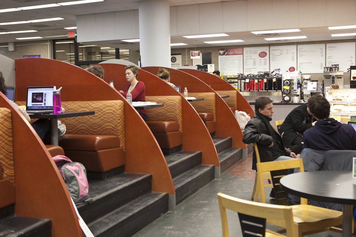 Tables and booths at Open Book Cafe