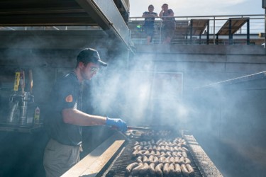 Brats on the grill at Jazz Fest