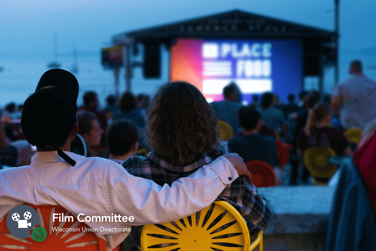A couple watches a film on the Terrace
