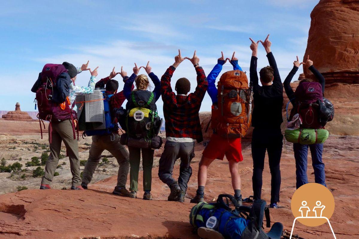 Group of people gathered for rock climbing and hiking