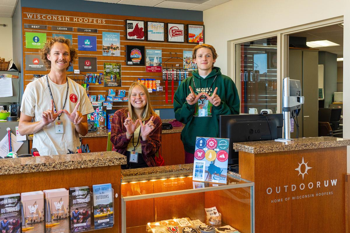People behind the Outdoor UW counter
