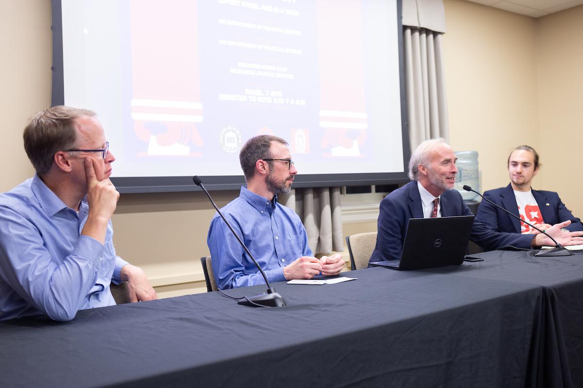 Speakers at a panel presentation
