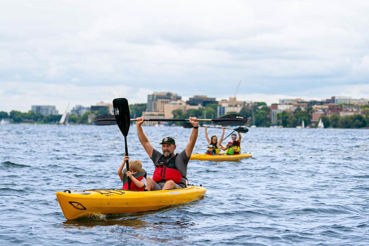 People kayaking on the lake with Outdoor UW