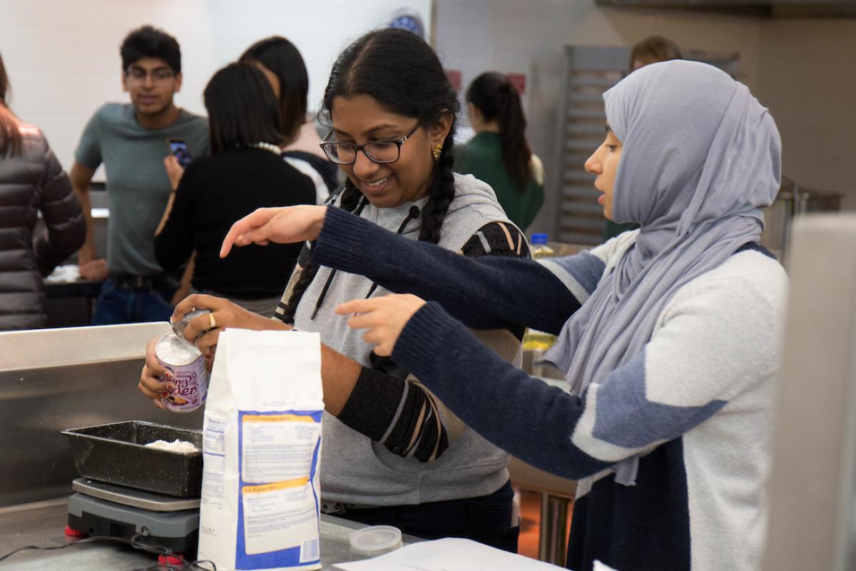 Participants at a WUD Cuisine cooking workshop