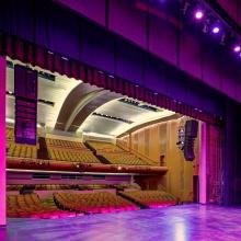 Shannon Hall stage lit in purple