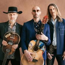 The Wood Brothers with guitars 